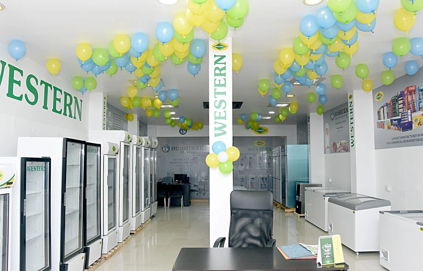 Technician servicing deep freezer at EKZON Solutions