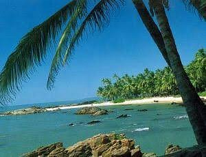 Payyoli Beach sunset with calm Arabian Sea waves
